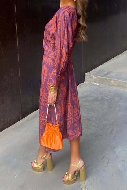 Jolie | Elegant twist front midi dress with floral print